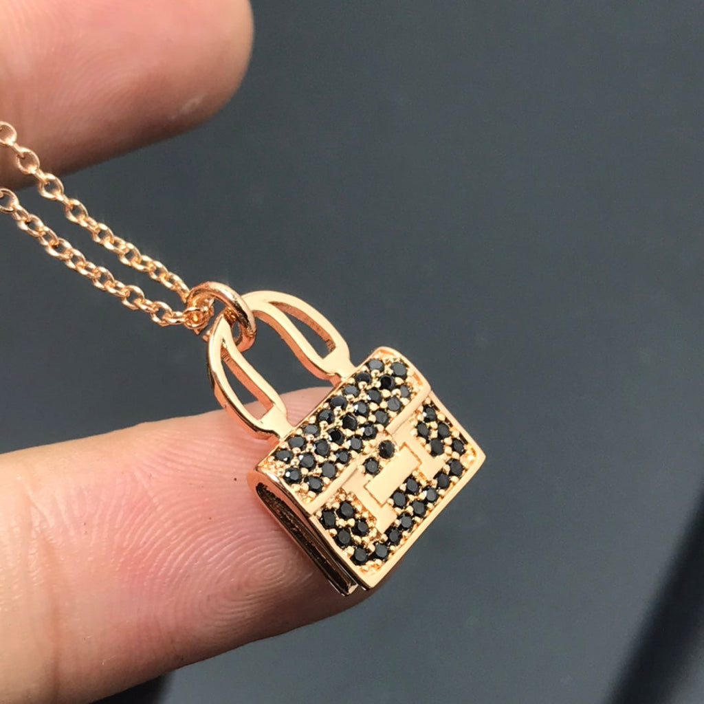 Hermes Amulettes Kelly Black Diamond Necklace