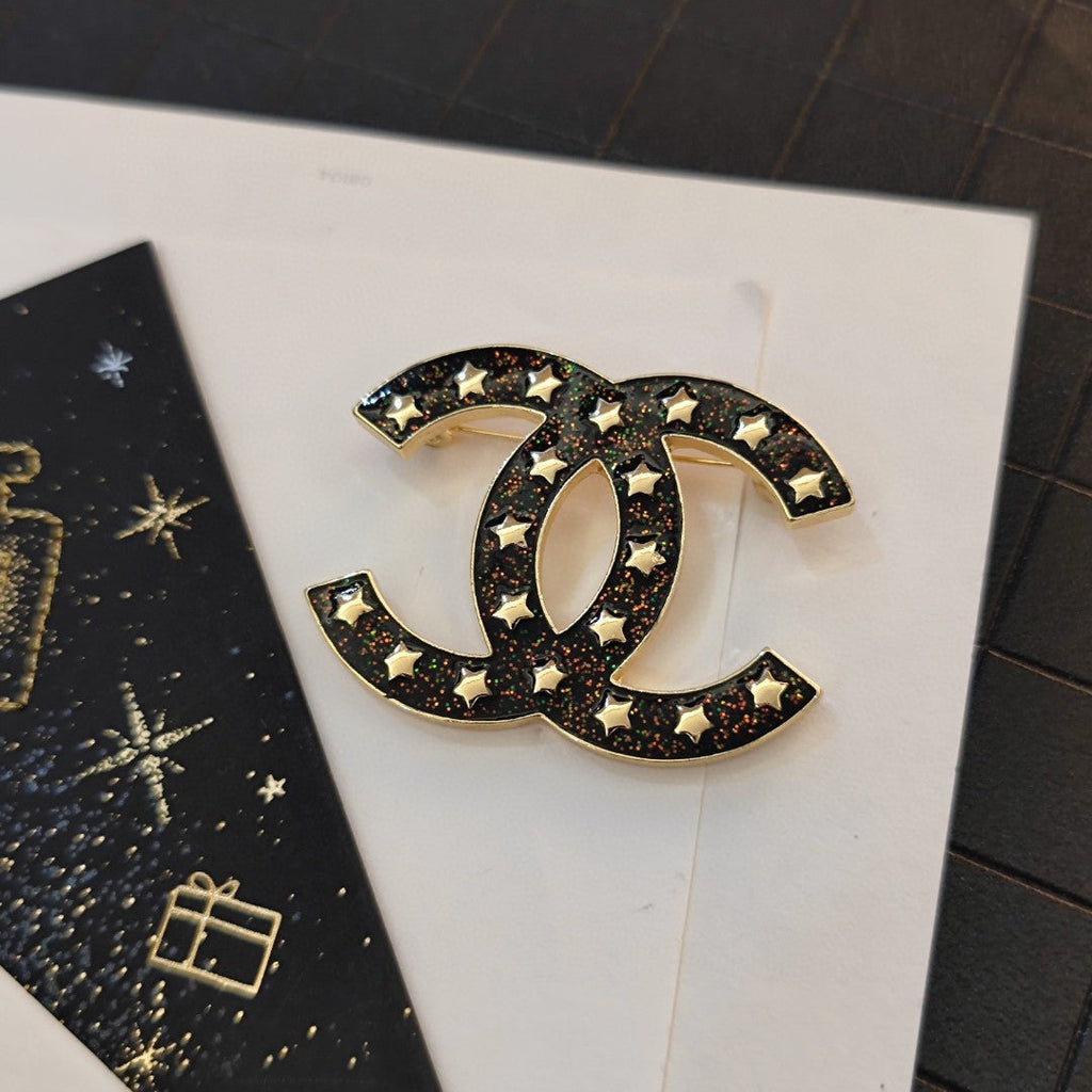 Chanel Black Star Brooch